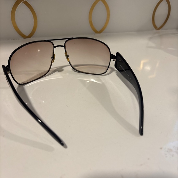 Versace 2060-B 1009/8G characterized by a brown/black frame crystal detailing main image 2